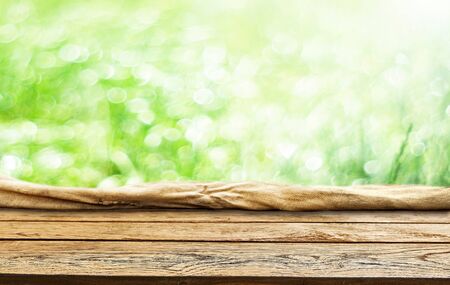 Spring green background wooden tableの写真素材