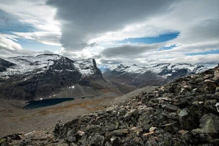 Beautiful high mountains landscape with lake