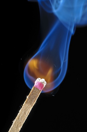Close-up shot of a single match strikeの写真素材