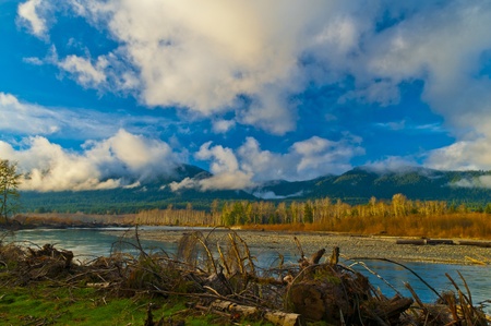 Quinault River landscape against dramatic cloudy skyの写真素材
