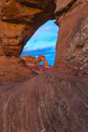 Delicate Arch at Sunset Framed by another natural archの写真素材