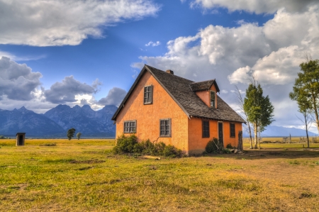 Mormon Row, with Teton Range in background, sunrise, Grand Teton National Park, Jackson Hole, Wyoming.の写真素材