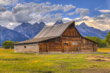 Mormon Row, with Teton Range in background, sunrise, Grand Teton National Park, Jackson Hole, Wyoming.の写真素材