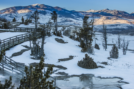 Boardwalk near the geyser - winter in Yellowstone National Parkの写真素材