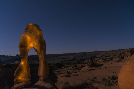 Long exposure night photography of famous landmark Delicate Arch - Arches National Park Moab Utah.