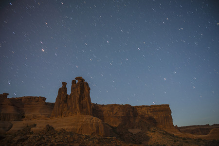 Courthouse Towers at night against beautiful starry skyの写真素材