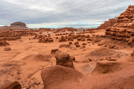 Strange and colorful landscape filled with bizarre sandstone rock formationsの写真素材
