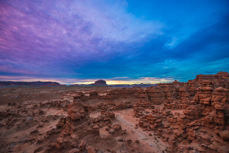 Bird's eye view of the Goblin Valley at Sunset with colorful sky aboveの写真素材