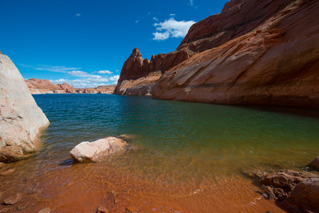 Hole in the Rock Beach on the bottom of a steep descent Glen Canyon Utahの写真素材