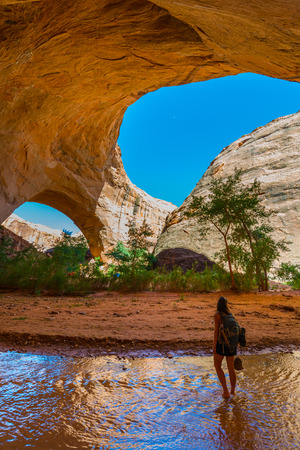 Woman Hiker Backpacker near Jacob Hamblin Arch Coyote Gulch Grand Staircase Escalante National Monument Utahの写真素材