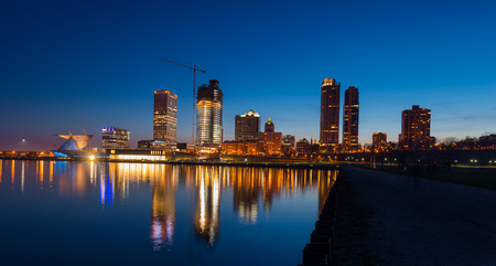 City of Milwaukee Wisconsin at Night lakefront ligts reflection in lake Michiganの写真素材