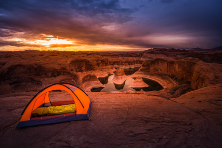 Small Orange Tent Lake Powell Reflection Canyon Beautiful Sunrise USA Travelの写真素材