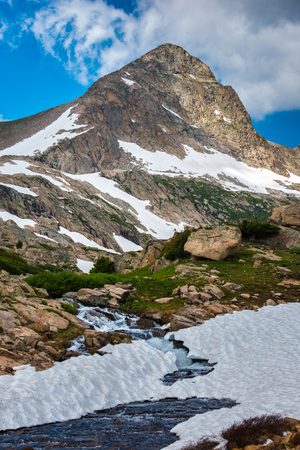 Blue Lake's outlet stream with Mt Toll in the background Colorado Indian peaks wildernessの写真素材