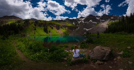 Backpacker Girl looks at Lower Blue Lake  Ridgway Coloradoの写真素材