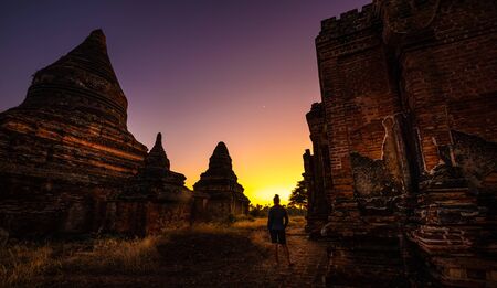 Bagan after Sunset Tourist Woman Visits old Temple Ruins