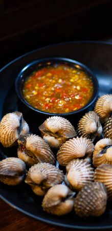 Close up of spicy steamed mussels, Thai Asian local seafood. Bangkok Thailandの写真素材