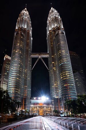 Kuala Lumpur, Malaysia. April 25, 2018: Night view of Petronas Twin Towers KLCC, the most attractive place in Malaysia. Night sky with highest buildings.のeditorial素材