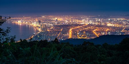 Da Nang City as seen from Ban Co Peak viewpoint at night, Vietnam.の写真素材
