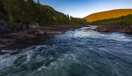 Otra river near bjornara, Agder at Sunset,  Sorlandet and Telemark Norwayの写真素材