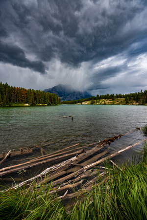 Dramatic Stormy Clouds over Cascade Mountain - Johnson Lake Banff National Park Alberta Canadaの写真素材
