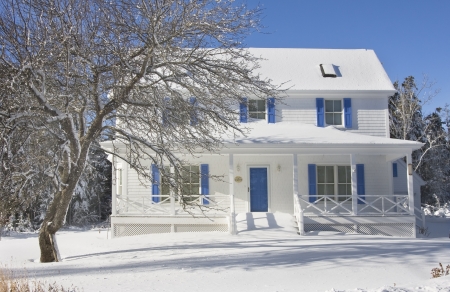 Summer cottage after snowstorm in coastal Maine のeditorial素材