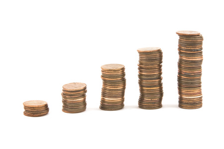  Pennies on white background symbolizing economic growth 