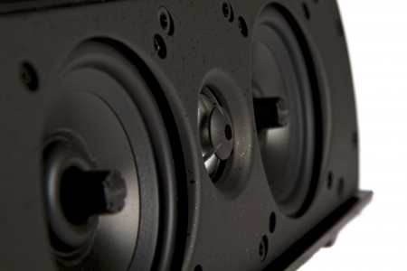 Closeup of an audio speaker resting on its sideの写真素材