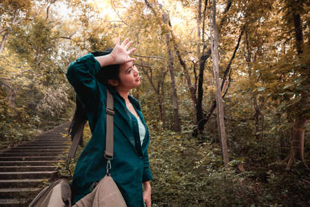 Tired girl from the forest tripの写真素材