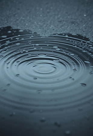 water drop with a black backgroundの素材