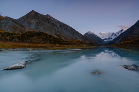 View from lake Akkem on mountain Belukha near board between Russia and Kazahstan during golden autumnの写真素材