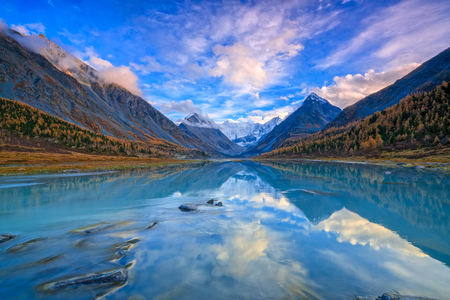 View from lake Akkem on mountain Belukha near board between Russia and Kazahstan during golden autumnの写真素材