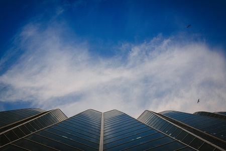 perspective view on sky and clouds in city of art and science in Valenciaの写真素材