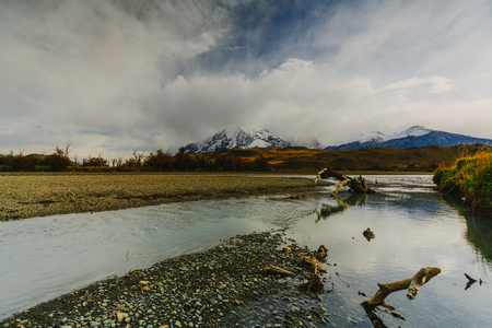 View of the mountains and the river in Torres del Paine National Park. Autumn in Patagonia, the Chilean sideの写真素材