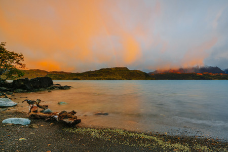 View of the lake in Torres del Paine National Park during sunset. Autumn in Patagonia, the Chilean sideの写真素材