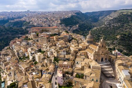 Aerial view of the old town of Ragusa and a winding road. Sicily Island Italyの写真素材