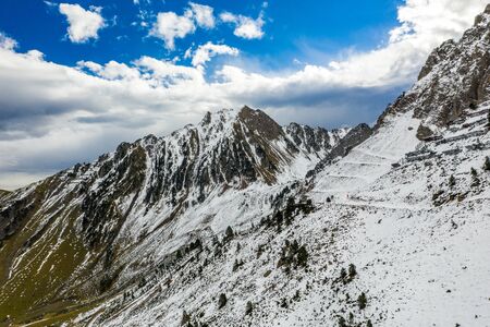 Aerial view of the valley and mountains after the first snow near the village of La Mongie. Pyrenees of Franceの写真素材
