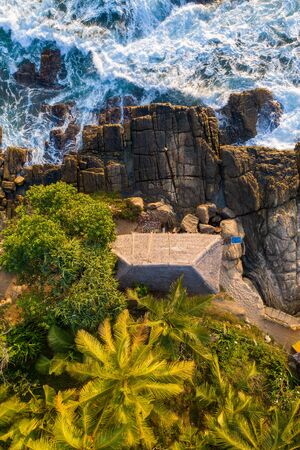 Aerial view of palm trees, Indian Oken coastline and bungalows. Island Sri Lanka.の写真素材