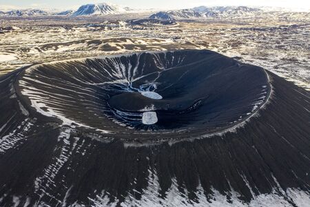 Aerial view of the crater of the volcano Hverfjall. Iceland in early springの写真素材