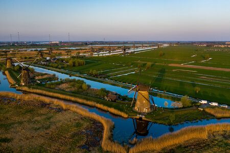 Aerial view of windmills in the Kinderdijk area during sunset. Spring in Hollandの写真素材