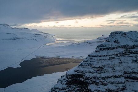 Aerial view of the snow-capped Mount Kirkjufell in early spring in Iceland.の写真素材