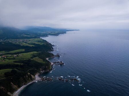 Aerial view of the coastline and cliffs at Silencio Beach. Northern Spain in summer