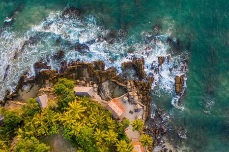 Aerial view of palm trees, Indian Oken coastline and bungalows. Island Sri Lankaの写真素材