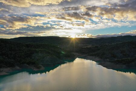 Aerial view of the Embalse de Mediano reservoir during sunset. Spain in the fall
