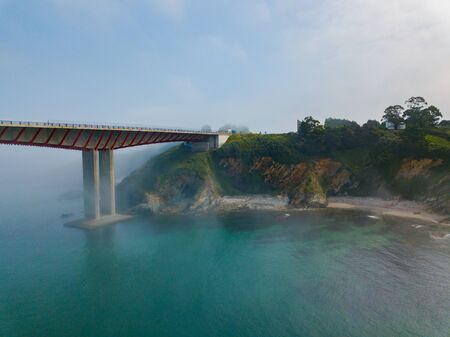 Aerial view on dos Santos bridge during fog and bay. Near Ribadeo in Northern Spain