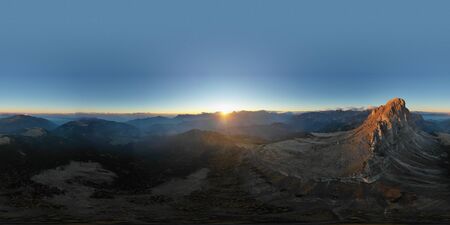 Aerial view of the valley and Mount Peitlerkofel during dawn. Dolomites in South Tyrol