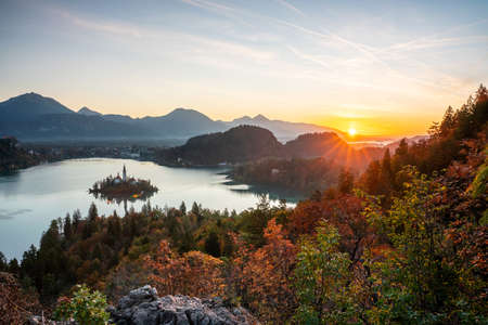 The silence of the ancient cities of Europe. Panoramic morning view of the Pilgrimage Church of the Assumption of Mary. Exciting autumn scene of Lake Bled, Julian Alps, Slovenia, Europe.の写真素材