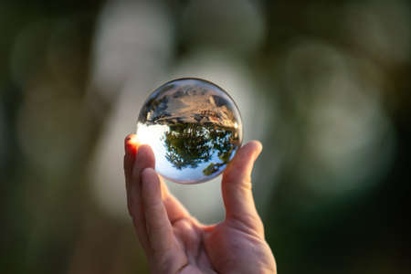 View of Sri Lanka through a glass ball, sunset summertime.の写真素材