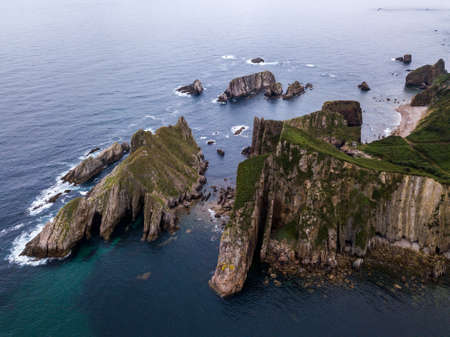 Aerial view of the coastline and cliffs at Silencio Beach. Northern Spain in summer