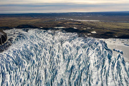Aerial view of the Sv nafellsj kull glacier in sunny weather. The beginning of spring in Icelandの写真素材