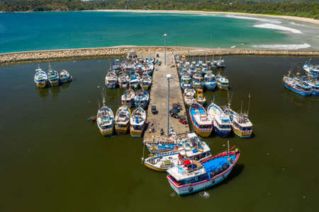 Aerial view of fishing boats and fish market in the south of Sri Lankaの写真素材